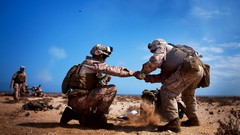 War Guns soldiers shells mortar Afghanistan blue skies US 