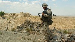 War ruins soldiers patrol infantry NATO Afghanistan Polish 