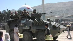 War soldiers military patrol cities tanks NATO mosques 