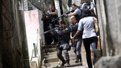 War weapons Guns police alley slum Rio de Janeiro Brazil raid 