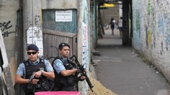 War weapons Guns police alley slum Rio de Janeiro Brazil raid 