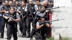 War weapons Guns police running slum Cover Rio de Janeiro 