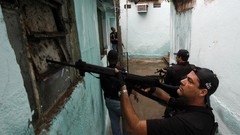 War weapons Guns police slum Rio de Janeiro Brazil raid narrow 