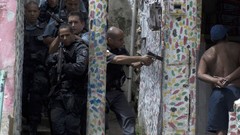 War weapons Guns police slum Rio de Janeiro Brazil raid pistols 