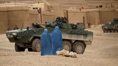 War woman soldiers patrol tanks NATO Afghanistan apc Polish 