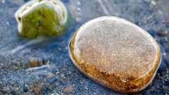 Water close-up sand rocks