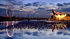 Water clouds evening City Lights reflections buildings skies 