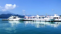 Water clouds hills ships Boats dock lakes piers skies