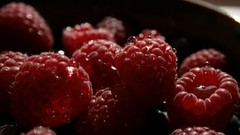 Water drops raspberries
