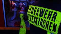 Water fire lights trucks phones firefighter