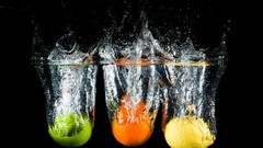 Water food oranges black background lemons splashes