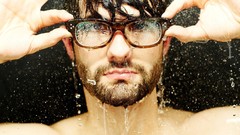 Water hands wet nerd men with glasses studio rain