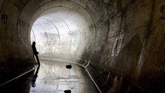 Water light woman tunnel reflections scape
