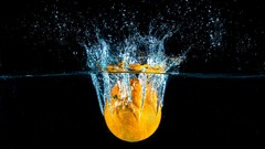 Water oranges fruits splashes
