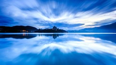 Water reflections buildings skies