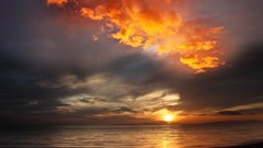 Water sunset clouds orange