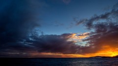 Water sunset ocean clouds