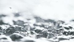 Water white close-up bokeh splashes