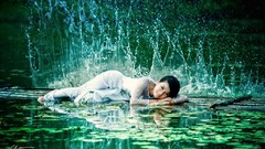 Water woman asians white dress lily pads Viet Nam ao dai