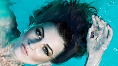 Water woman bubbles faces brunettes looking up swimming pools 