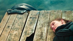 Water woman closed eyes lying down wood texture