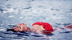 Water woman closed eyes models bikini floating