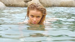 Water woman faces blondes wet hair