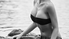 Water woman monochrome short hair cleavage
