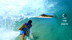 Waves surfing surfers