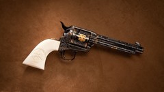 Weapons Guns pistols golden revolvers