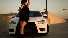 White brunettes black dress Mitsubishi Evo