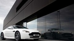 White cars Aston Martin reflections