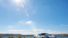 White cars lotus evora