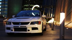 White cars Mitsubishi vehicles mitsubishi lancer front angle 