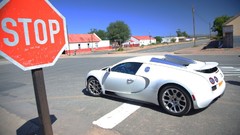 White cars stop grand bugatti veyron