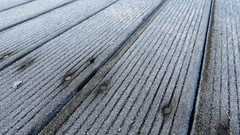 White ice brown frost Frozen deck nails Wood