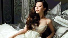 White woman dress beds asians brunettes looking away