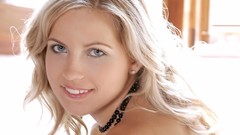 White woman faces blondes smiling gray eyes necklaces Jenni 