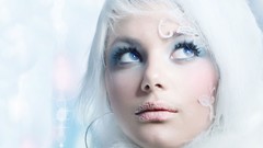 White woman faces blue eyes