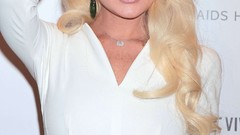 White woman Lindsay Lohan Actress blondes smiling singers