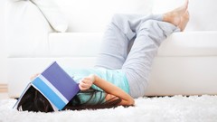White woman studio barefoot lying down