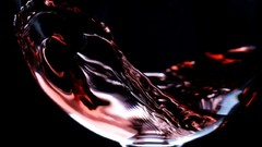 Wine alcohol black background Red water