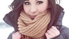 Winter white woman wool coat earrings scarfs smiling brown eyes 
