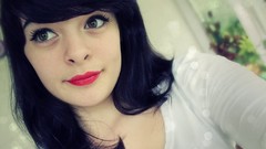 Winter woman blues black hair red lipstick