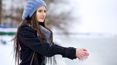 Winter woman holding hands