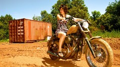Woman Actress models motorbikes