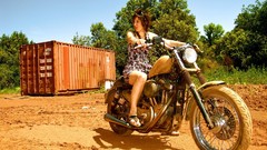 Woman Actress models motorbikes