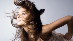 Woman air brunettes models hair in face