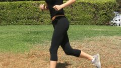 Woman Ali Larter running