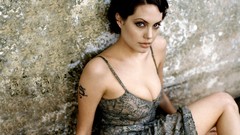 Woman Angelina Jolie tattoos short hair